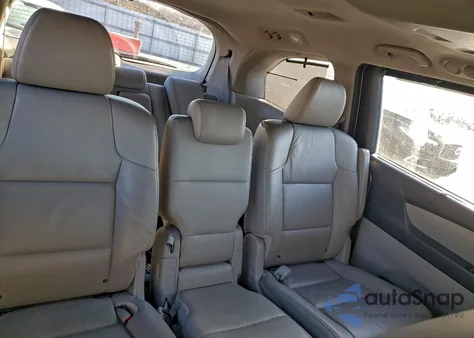 2012 Honda Odyssey Touring z USA, uszkodzony, nr VIN 5FNRL5H92CB124548